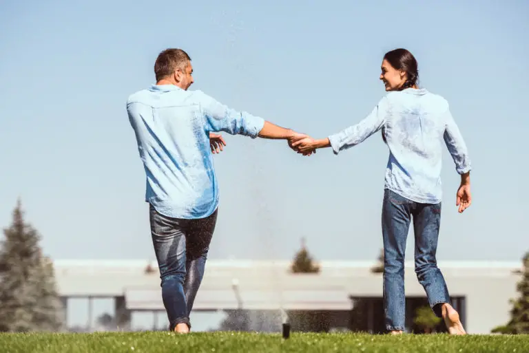 man and woman holding hands